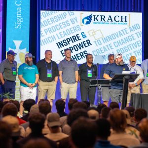 Order of Constantine Sig Jose Tovar, SAM HOUSTON 1986, is pictured in the teal shirt fourth from the left during the closing session of the 2023 Krach Transformational Leaders Workshop.